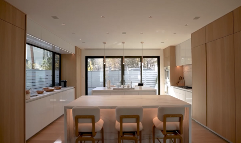 A modern kitchen with invisible speakers from Sonance installed.