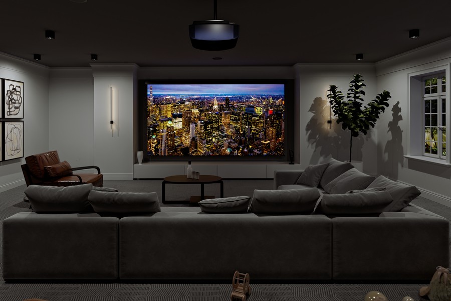 A plush home theater in Oklahoma City with a large screen showcasing a vibrant cityscape and comfortable seating showcasing custom AV design. 